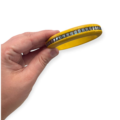RIVETING YELLOW BANGLE