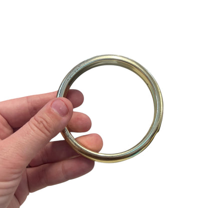 WORN GOLDEN BANGLE