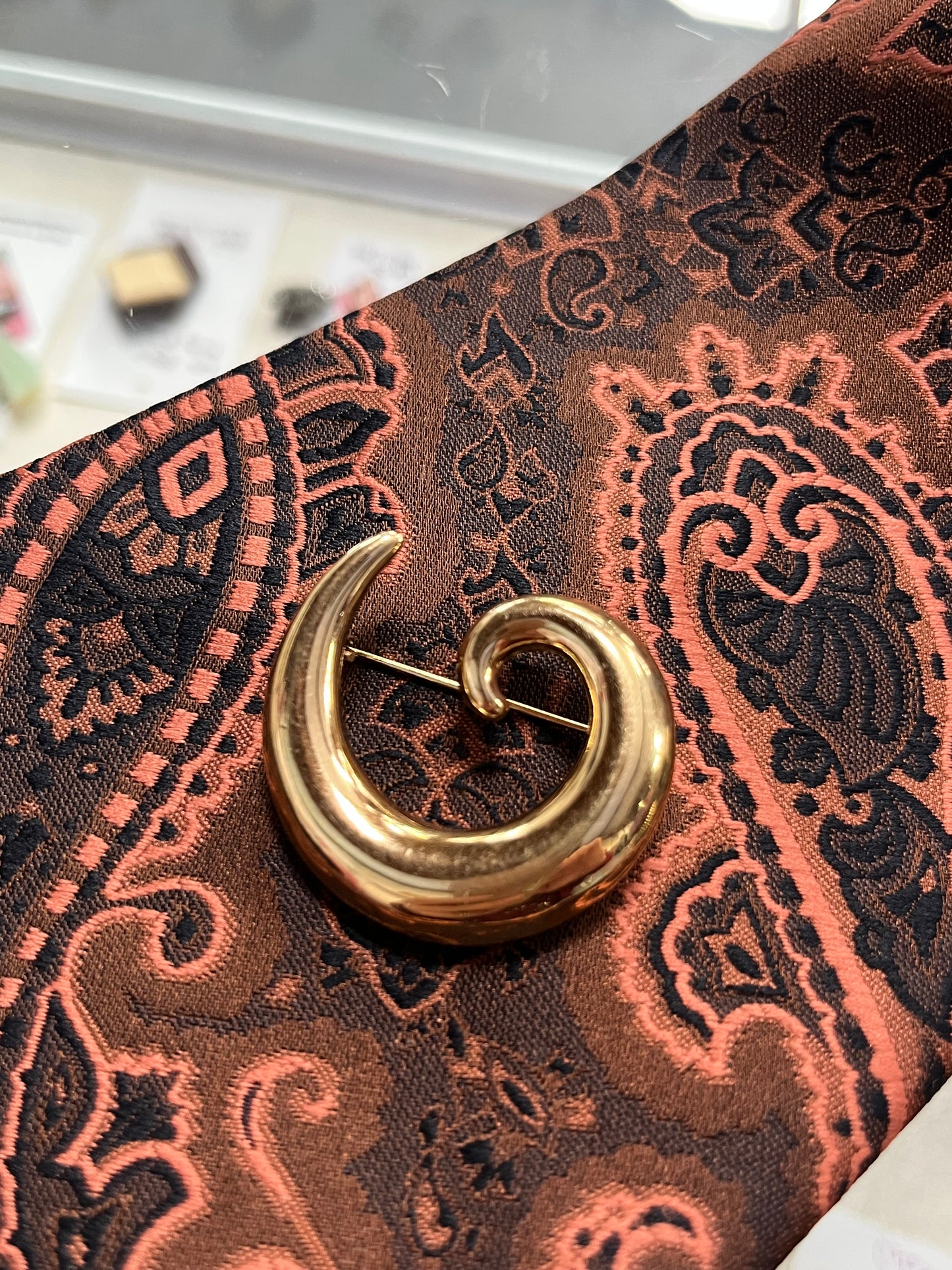 GOLD SPIRAL BROOCH