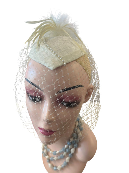 CREAM OVAL BIRDCAGE HEADPIECE