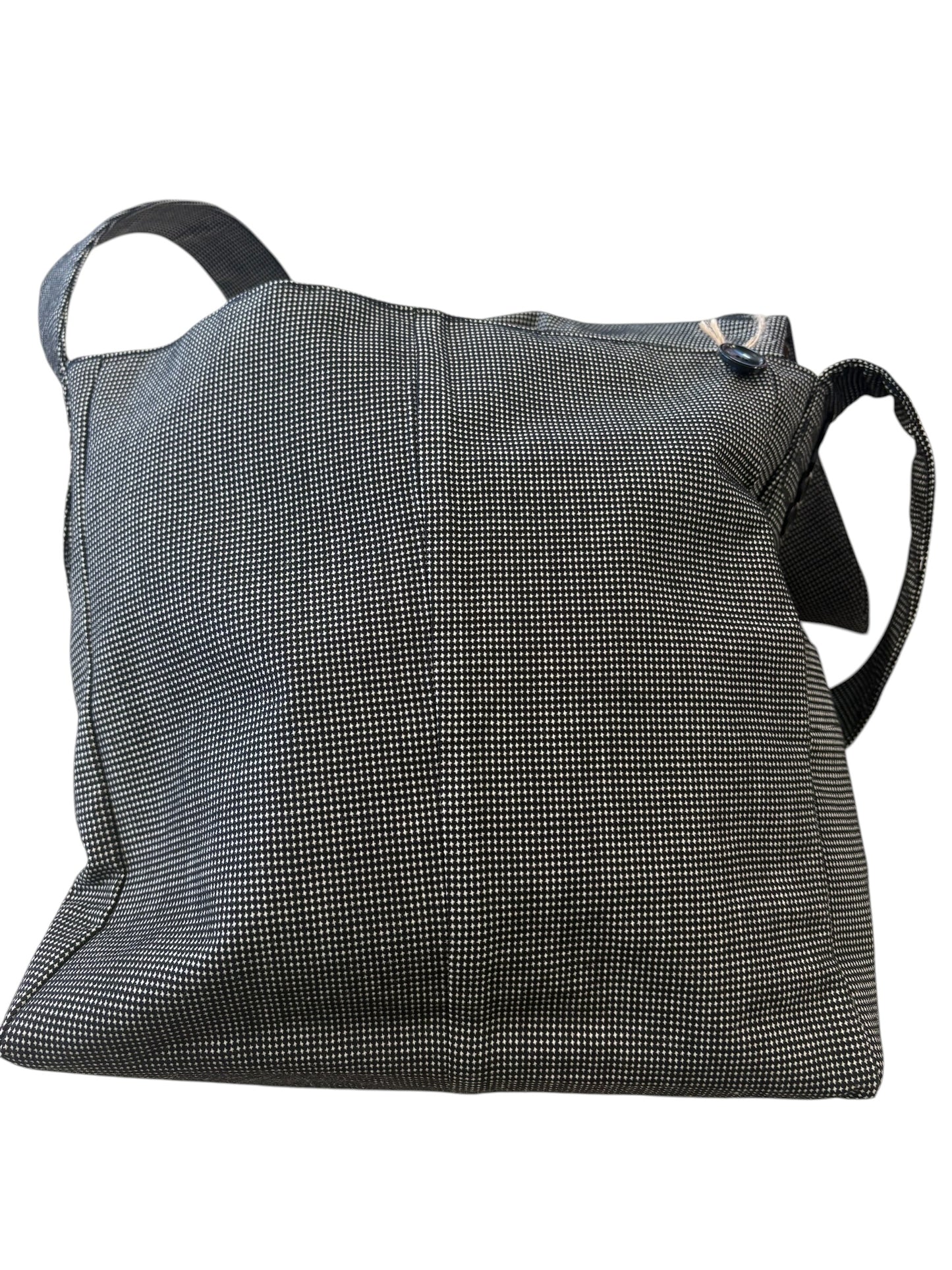 Front inside under flap. 