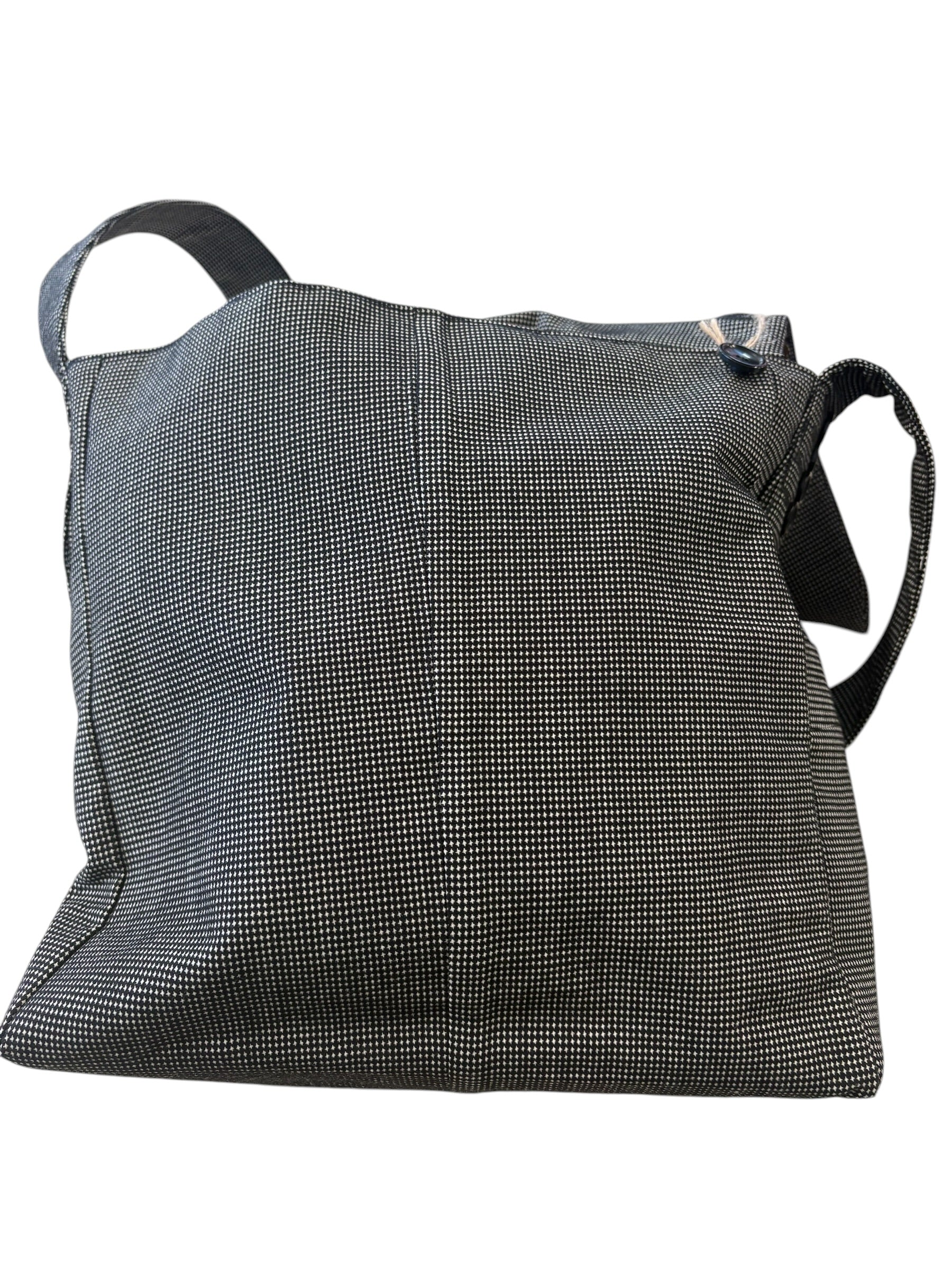 Front inside under flap. 