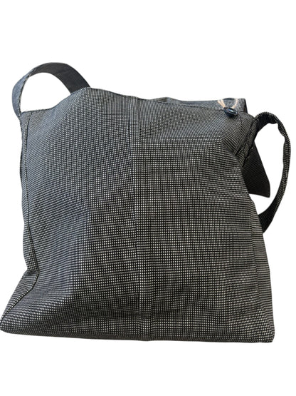 Front inside under flap. 