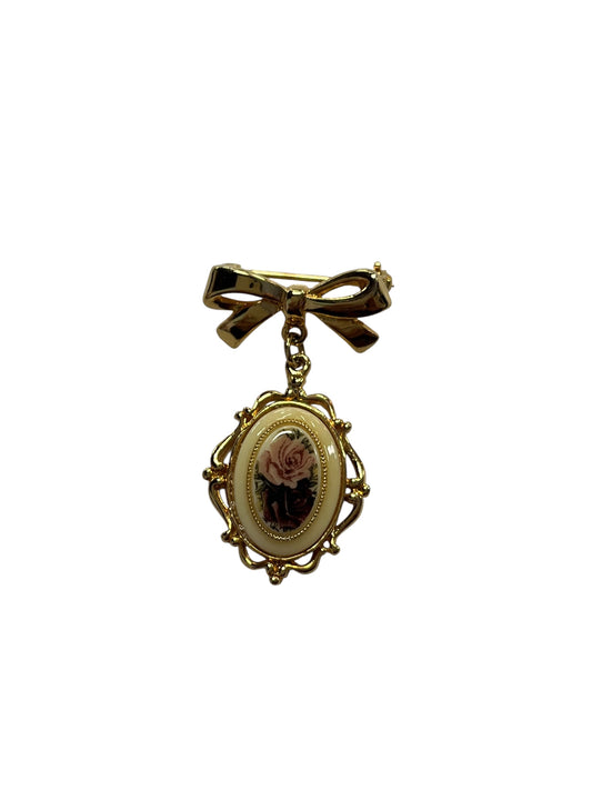 BARCS BOW PENDANT FLORAL BROOCH