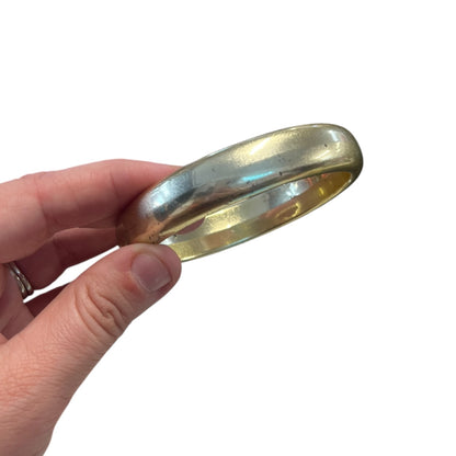 WORN GOLDEN BANGLE