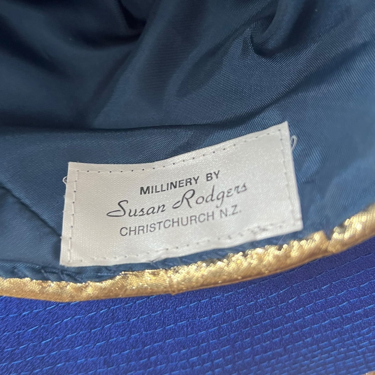 SUSAN ROGERS BLUE & GOLD HAT